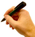Pen held in handwriting position